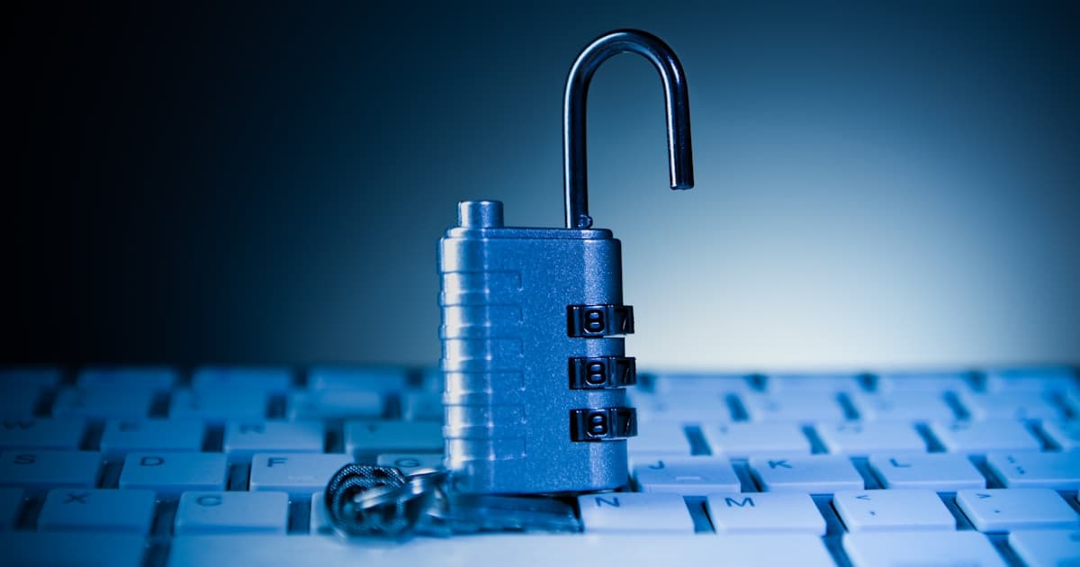 A padlock on a keyboard representing AI agent containment