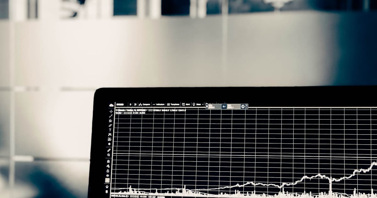 Padlock over financial chart, symbolising cyber-risk in banking