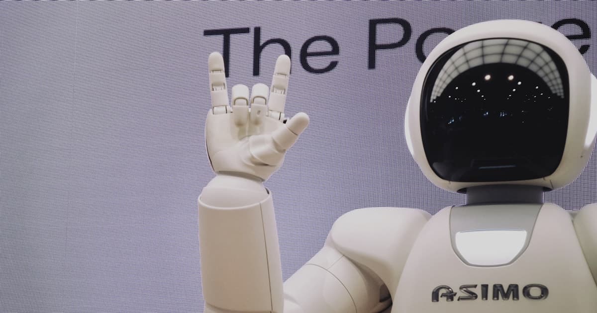 Robotic arm working on a factory floor