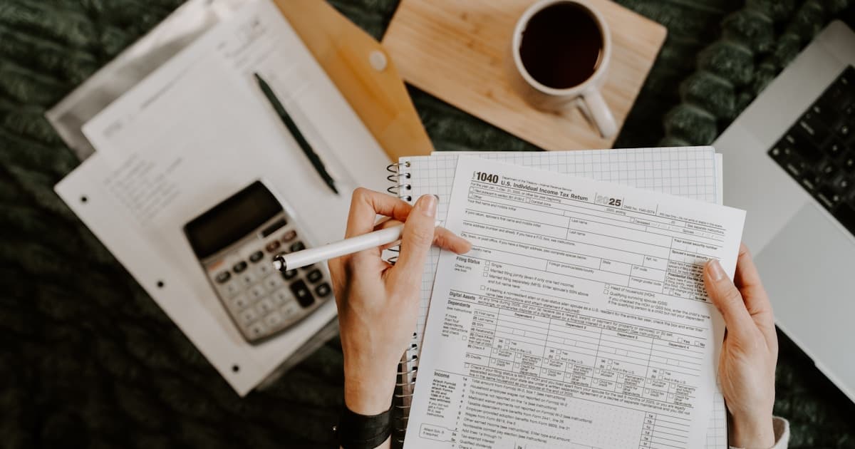 Tax documents and calculator representing AI tax agents